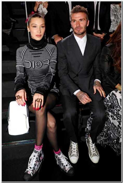 «Виктория Бекхэм бьет тревогу»: ее супруг приставал к Белле Хадид на показе Dior