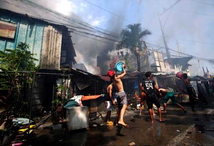 12+ суровых кадров о том, как живут люди в самых крупных трущобах Филиппин