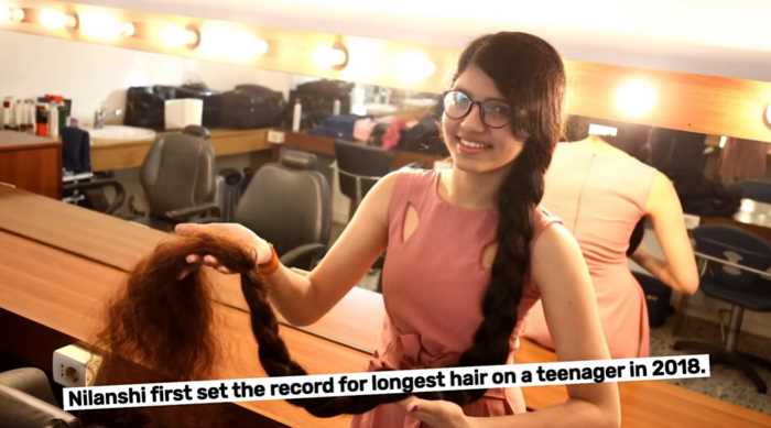 Девушка с самыми длинными волосами в мире решилась отстричь их впервые за 12 лет