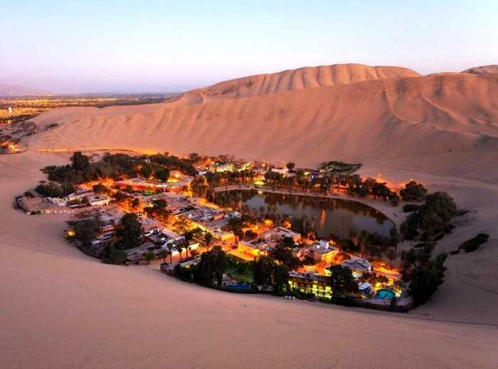 Реальное чудо в пустыне: люди построили маленький городок вокруг озера